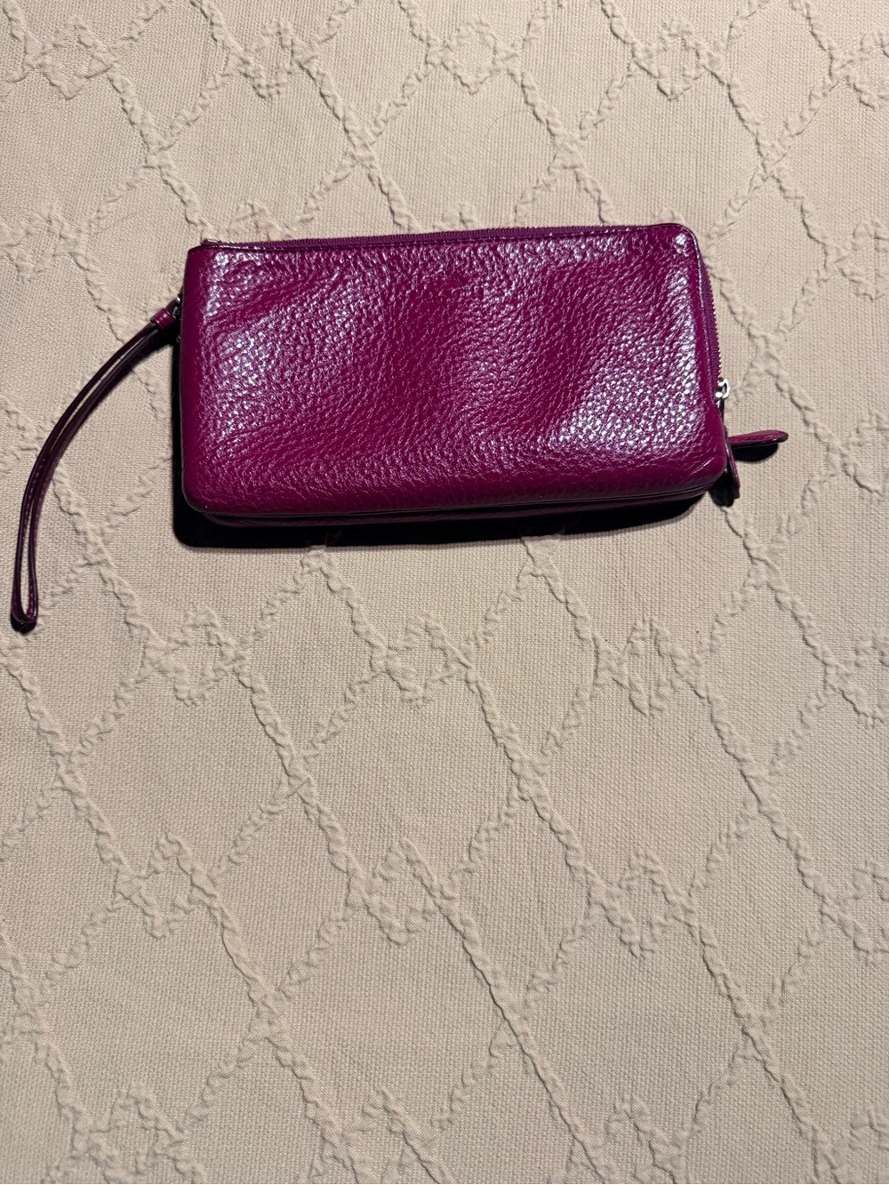 Coach Pebbled Leather Wristlet in Magenta